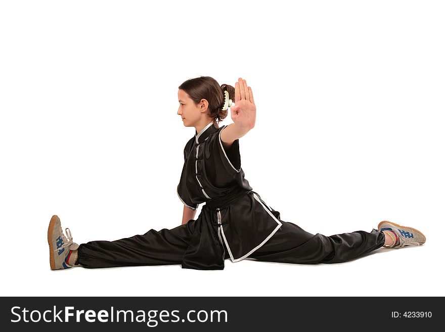 Wushu girl makes splits on white