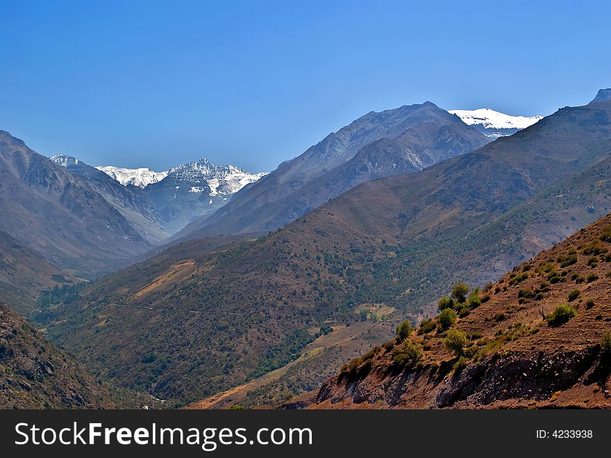 View of La leonera and El Plomo mountains, Los Andes, Chile