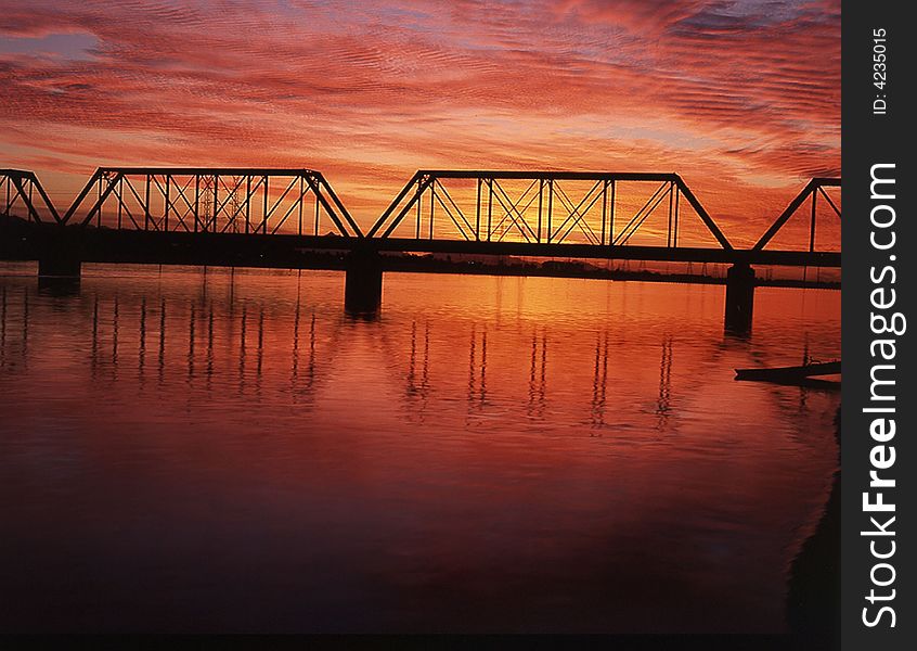 Railroad trestle at sunset