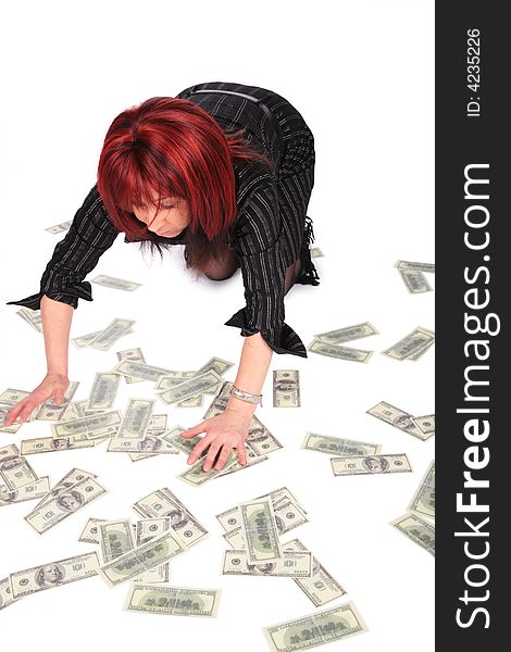 Woman gathering dollars