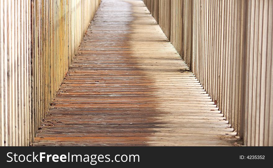 Wet wooden pavement in an agricultural building