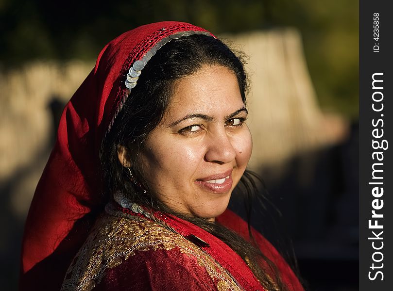 Muslim woman wearing a head scarf outdoors. Muslim woman wearing a head scarf outdoors