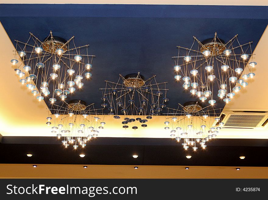 Nice modern chandeliers in the room