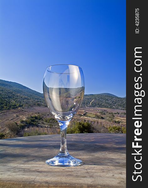 Empty wine glass against landscape in the Galilee Israel