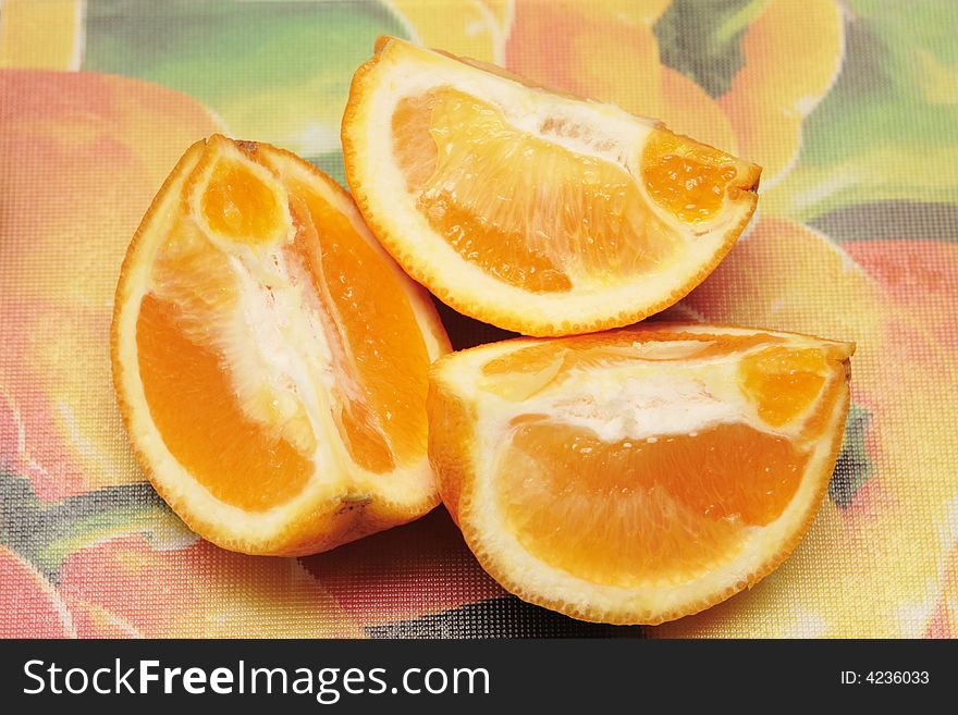 Three pieces of fresh orange