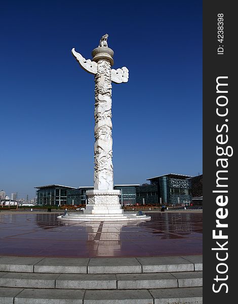 Ornamental column in front of places Xinghai Square. Ornamental column in front of places Xinghai Square