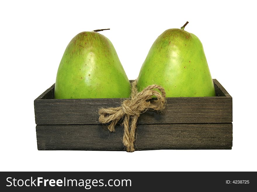 Pears in the wooden box. Isolated on white.