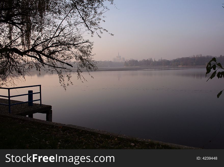 Herastrau lake in autumn - Bucharest, Romania - biggest park in town - in back, Free Press House