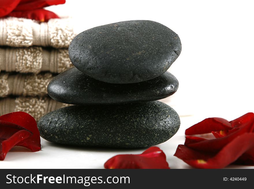 Three zen stones on white color background