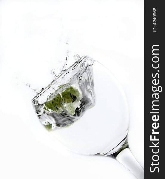 Water splash in glass isolated