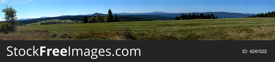 Nice landscape with forest,  hills and meadows - panorama. Nice landscape with forest,  hills and meadows - panorama