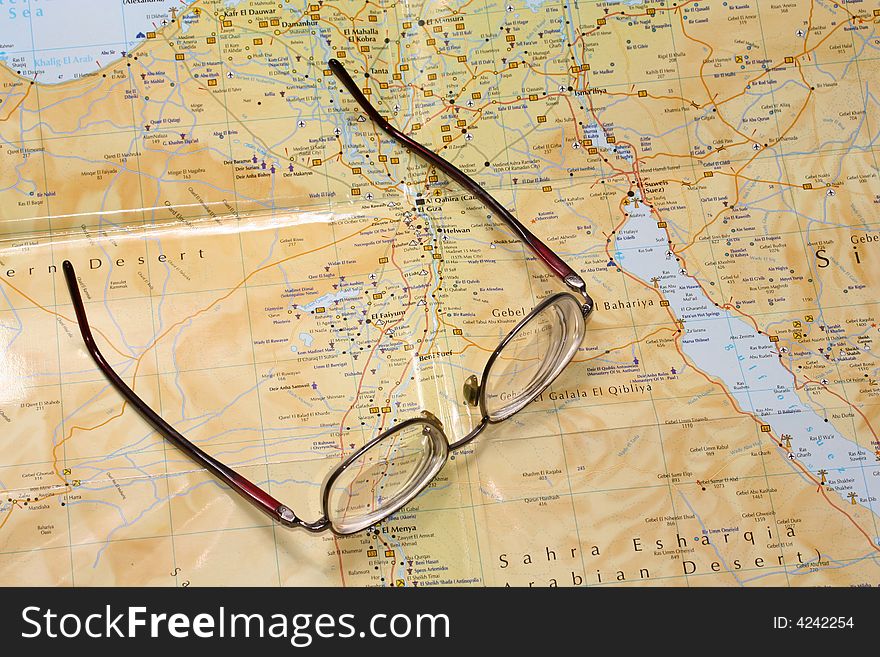 Glasses Laying On A Map
