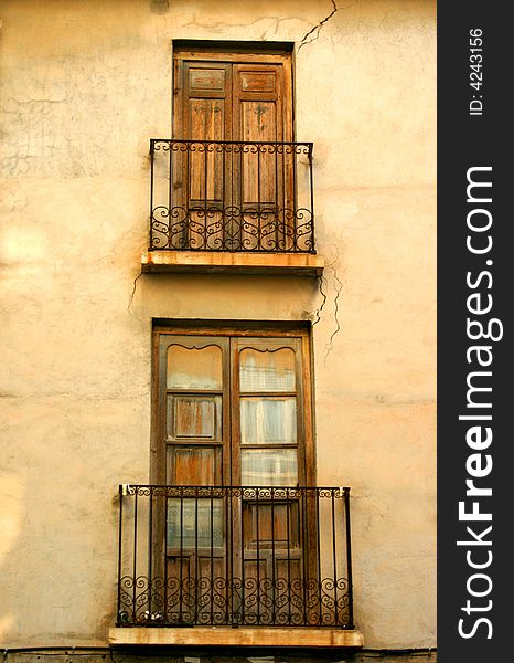 Photo of old Spanish doors and shutters. Photo of old Spanish doors and shutters