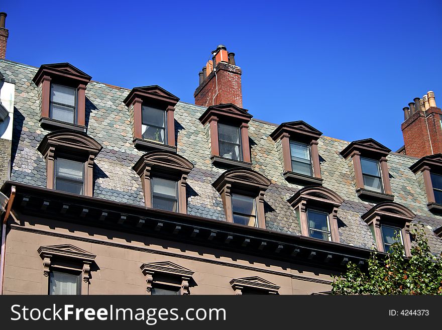 Beacon Hill is a wealthy neighborhood of Federal-style rowhouses, with some of the highest property values in the United States. Beacon Hill is a wealthy neighborhood of Federal-style rowhouses, with some of the highest property values in the United States