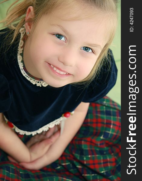 Close up of cute little girl in pretty black dress. Close up of cute little girl in pretty black dress.