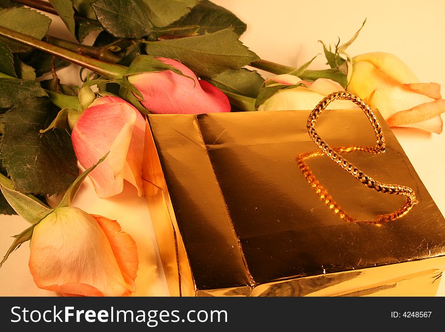 Gift bag in gold and roses. Gift bag in gold and roses