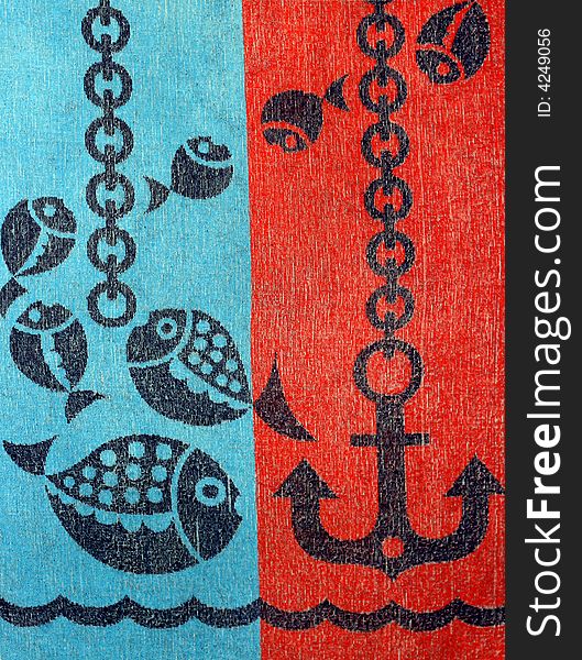 Detail of a child's bath towel with some fish and anchor