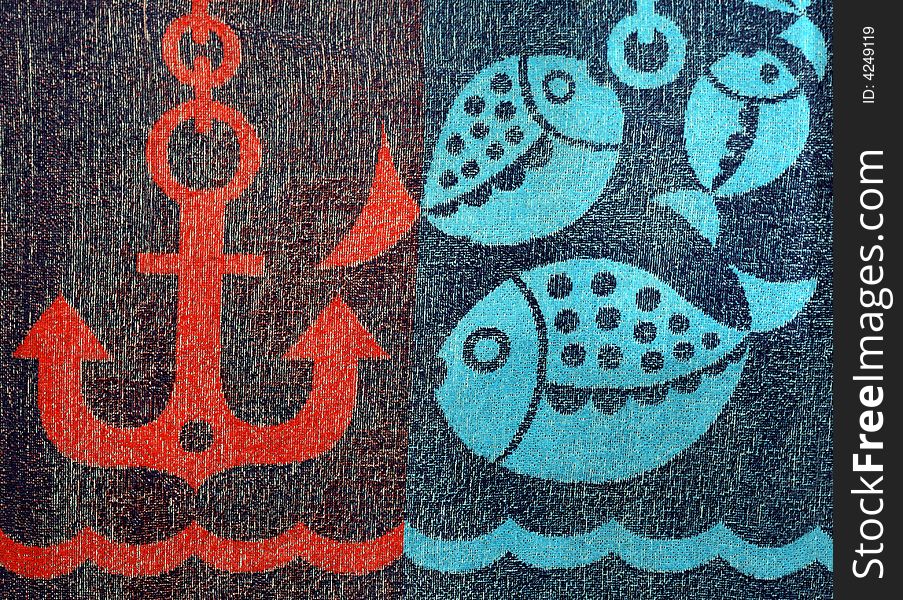 Detail of a child's bath towel with some fish and anchor