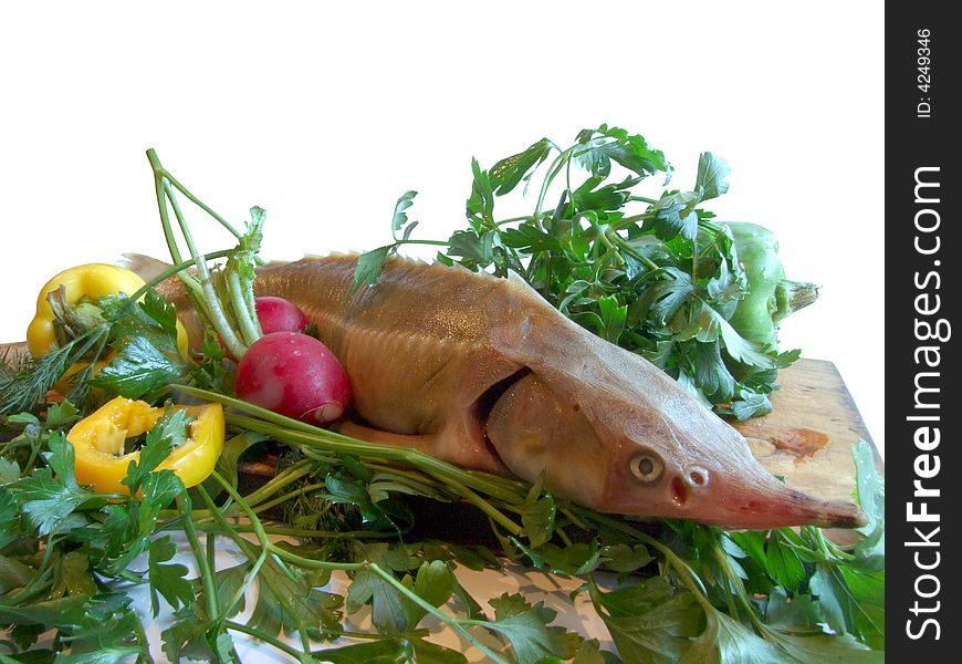 Sturgeon With Parsley And Pepper On A Kitchen