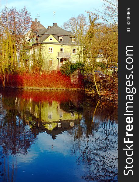 Reflection of a house in the Lahn river (near Frankfurt) in Germany.