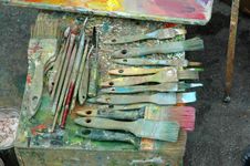 Artist Paint Palette With Paints And Brushes Stock Photo