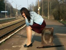 Girl Waiting For The Train Stock Photo