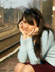 Girl Waiting For The Train Stock Photo