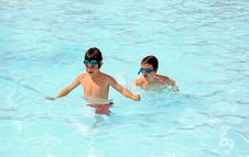 Boys Playing In The Pool Royalty Free Stock Images