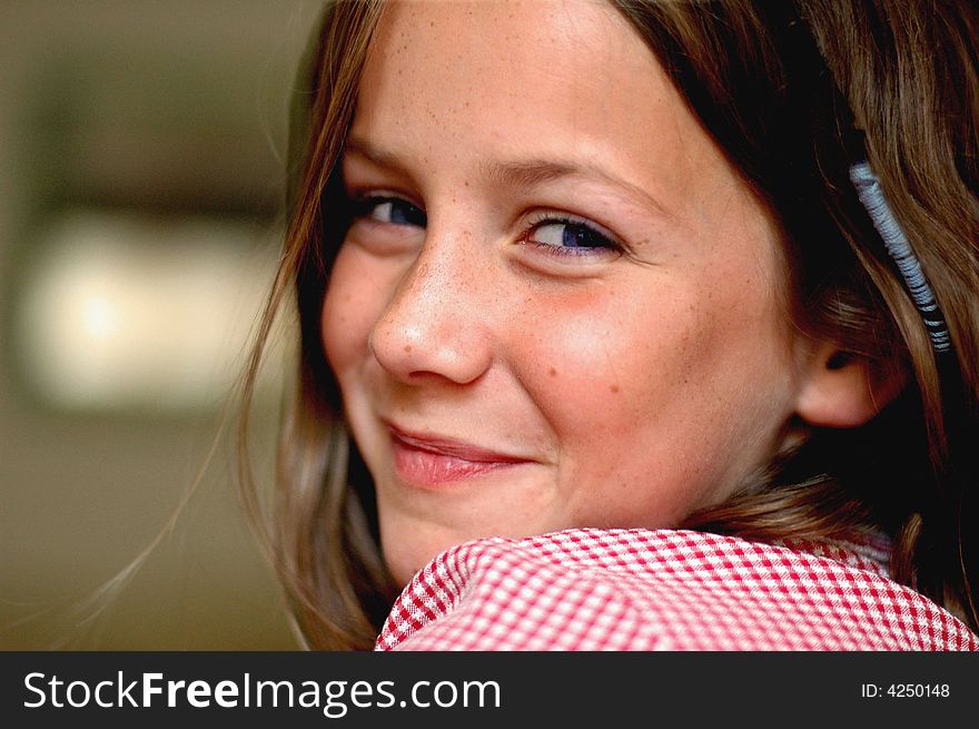 Close-up Portrait Of Smiling Girl