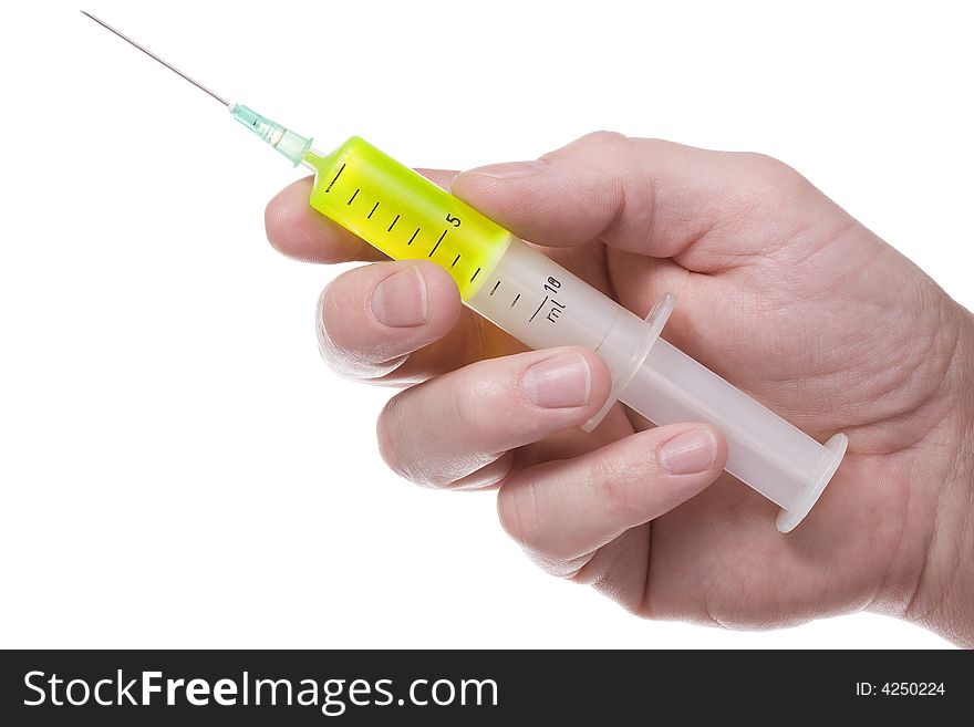 The man's hand holds syringe with green fluorescent liquid. Isolated on white. The man's hand holds syringe with green fluorescent liquid. Isolated on white.