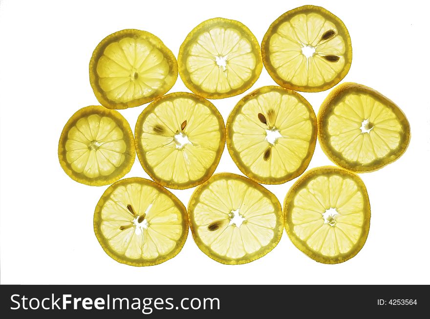 Lemon slices, backlit, stacked on top of each other. Lemon slices, backlit, stacked on top of each other