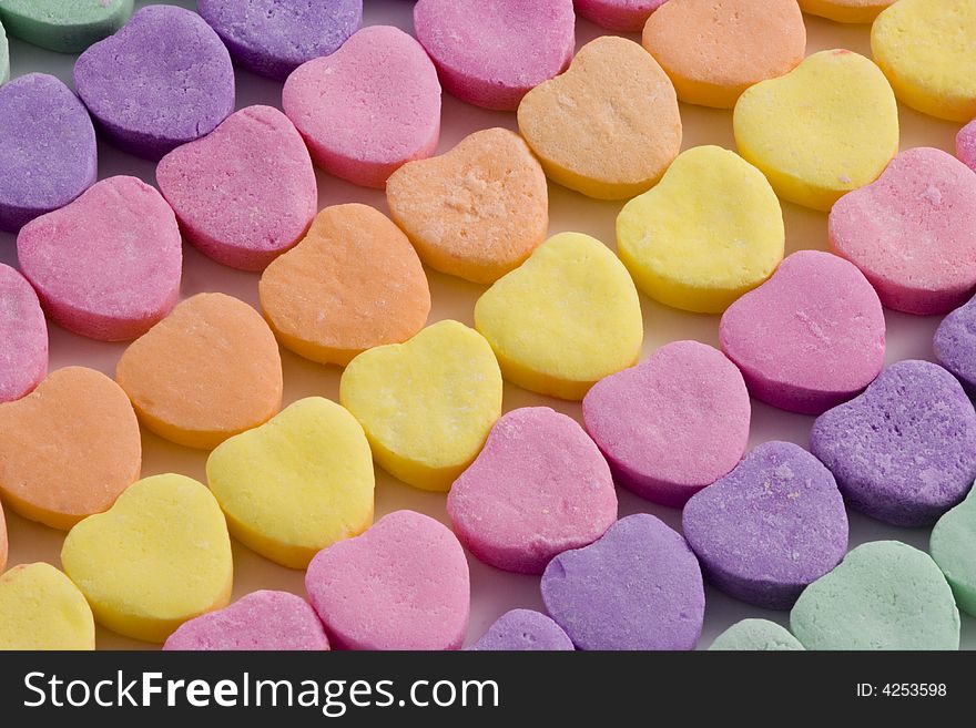 Closeup of colorful Valentine hearts arranged in rows. Closeup of colorful Valentine hearts arranged in rows.