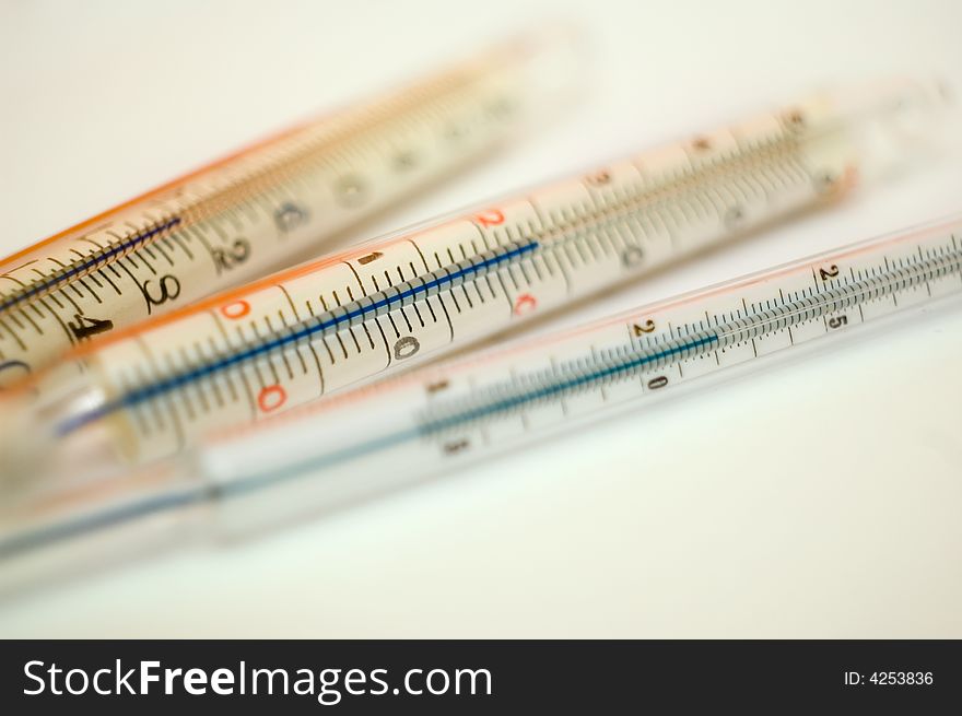 Group of three photographic thermometers.