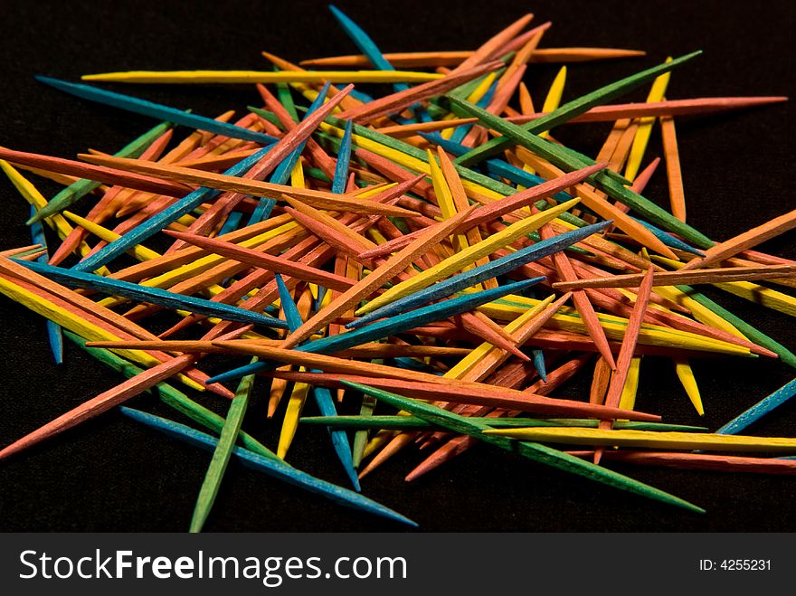 A shot of a pile of toothpicks. A shot of a pile of toothpicks.