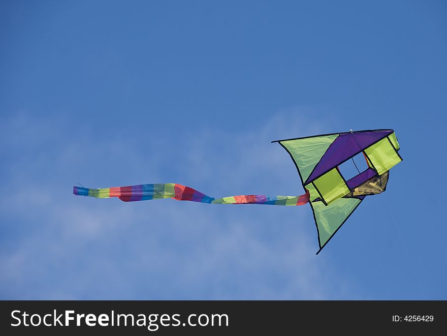 Kite against blue sky, Philippines