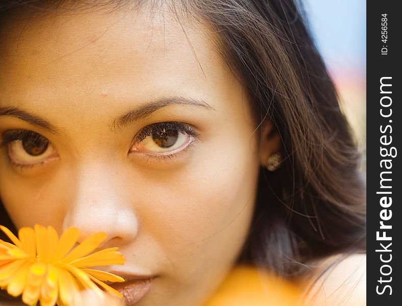 Portrait of Fresh and Beautiful woman with fresh spring flower. Portrait of Fresh and Beautiful woman with fresh spring flower