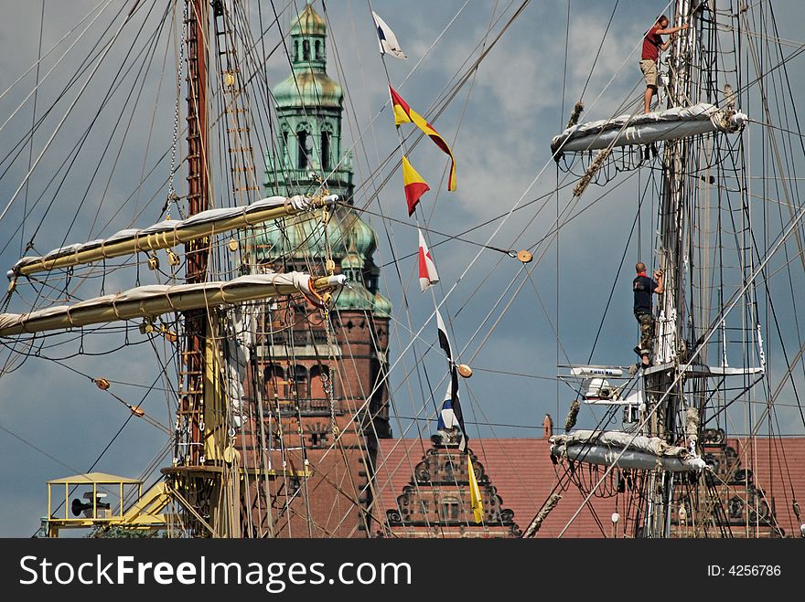 Masts of tall ships in a port