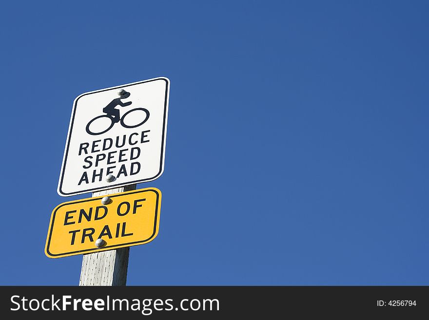 Reduce Speed Ahead, End of Trail Sign