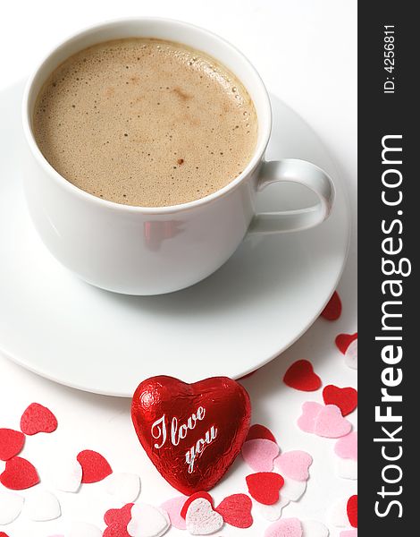 Coffee cup with coffe and heart on white background.
. Coffee cup with coffe and heart on white background.