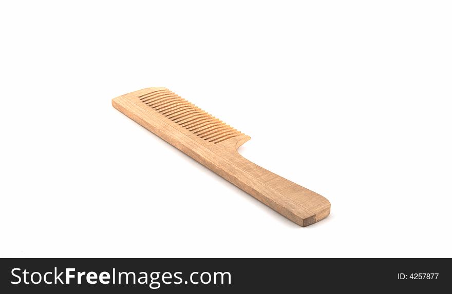 Wooden hairbrush on a white background