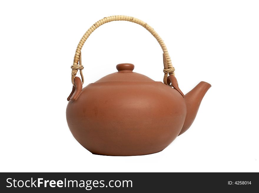 An image of the clay teapot. Studio isolated.