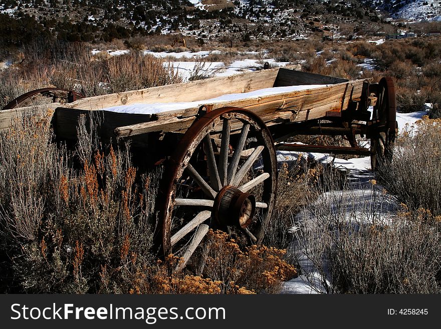 Old miners wagon lef in a field