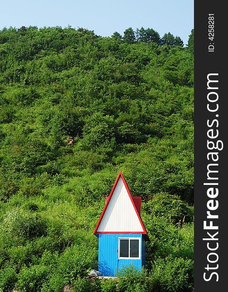 Polychrome spire hut at mountainside