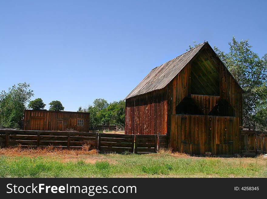 Old Hay Barn with blue skys and trees. Old Hay Barn with blue skys and trees