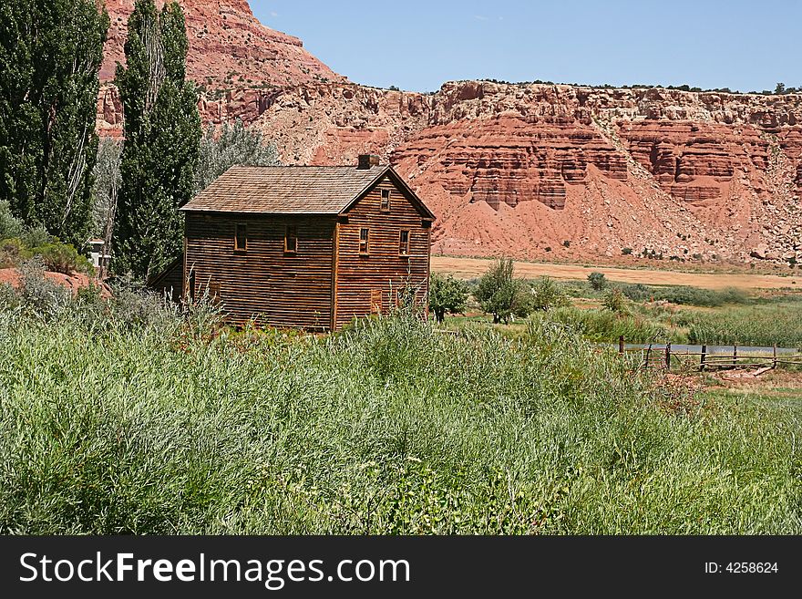 Old hay barn with a tree in the background rustic photo. Old hay barn with a tree in the background rustic photo