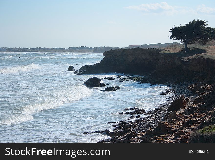 Eroded cliffs - stacks in mediterranean waves