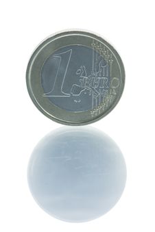 One Euro Coin Standing On Edge With Reflection Royalty Free Stock Images