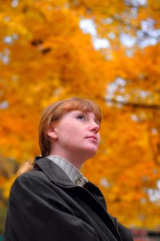 Woman Look Forward In Autumn Park Stock Image