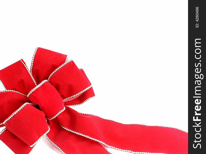 Red Bow on White Background with Copy Space