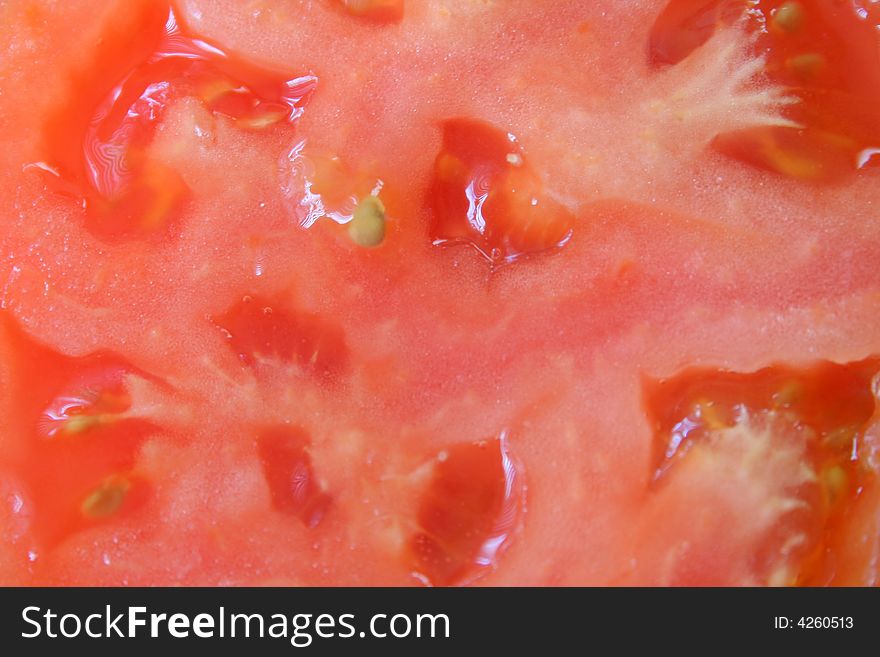 Macro of a tomato for an abstract or food background.